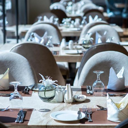 Vittori Palace Hotel And Residences Riyadh Exterior photo A table set for fine dining
