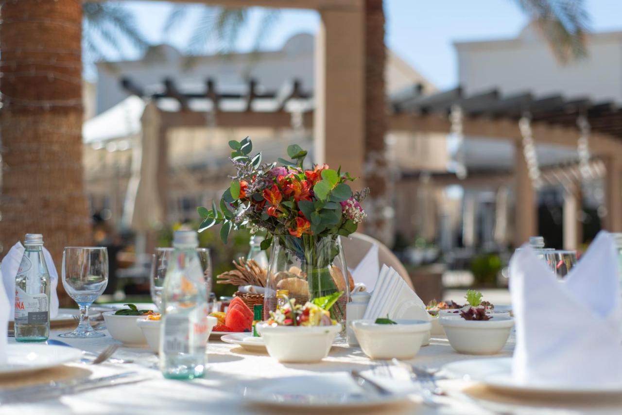 Vittori Palace Hotel And Residences Riyadh Exterior photo A table set for a meal