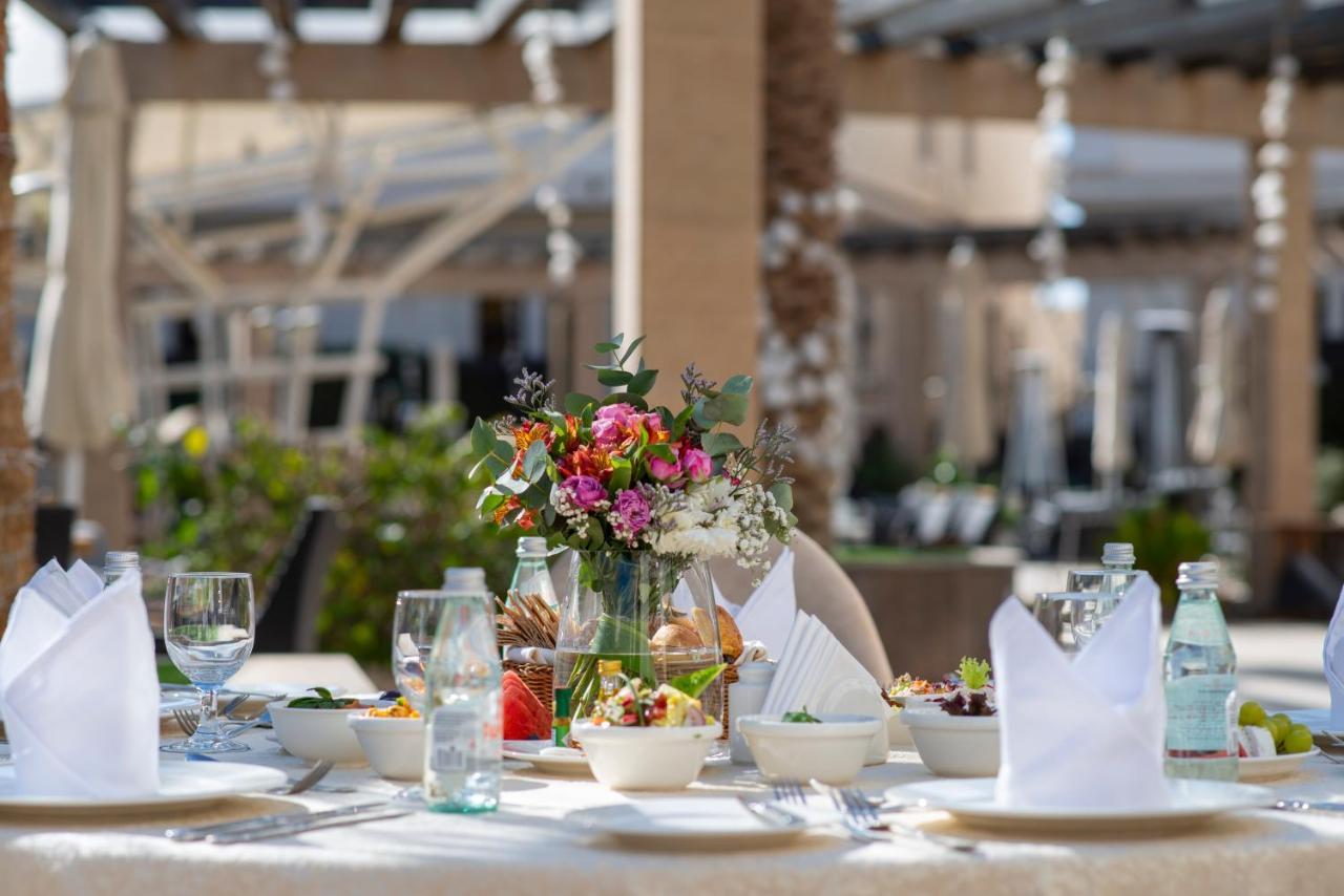 Vittori Palace Hotel And Residences Riyadh Exterior photo A table set for a meal