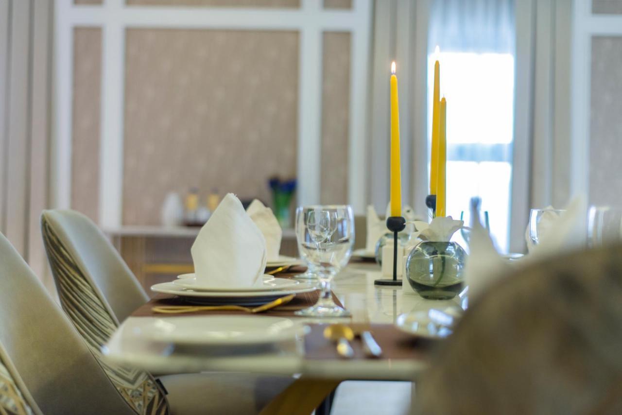 Vittori Palace Hotel And Residences Riyadh Exterior photo A table set for a meal